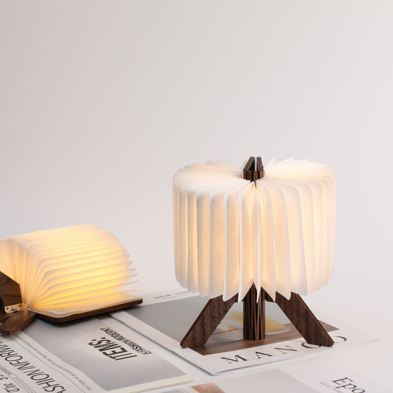 Lampada da tavolo moderna in carta origami fatta a mano curva, luce notturna a LED per ufficio
