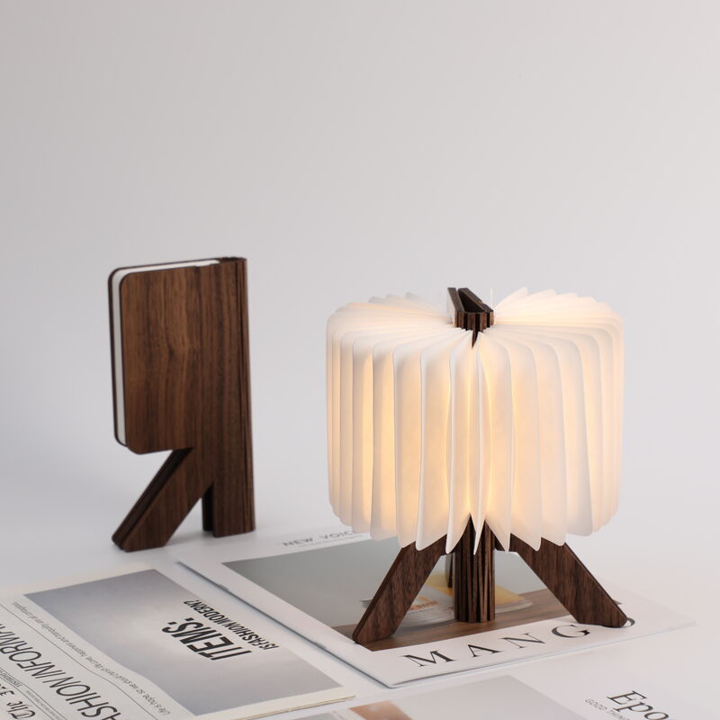 Lampada da tavolo moderna in carta origami fatta a mano curva, luce notturna a LED per ufficio